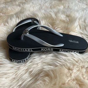 MICHAEL KORS WOMEN’S PLATFORM SLIPPERS